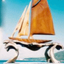 Scultura di Alessandro Starc che rappresenta una Barca lignea su base in metallo realizzata nel 2013
