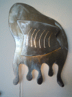 Applique di cm.32x45 in metallo lucidato e laccato denominata Medusa realizzata da Mauro Martoriati nel 2012